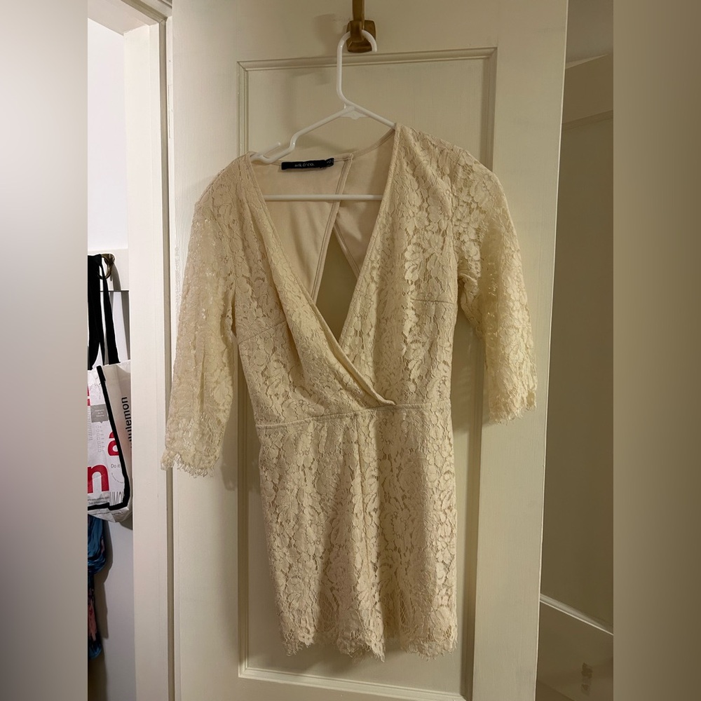 Elegant Cream Lace Romper